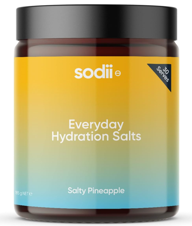 Sodii Everyday Hydration Salts — dark amber jar with sunset-yellow to teal label, Salty Pineapple flavour, 185g / 30 serves.